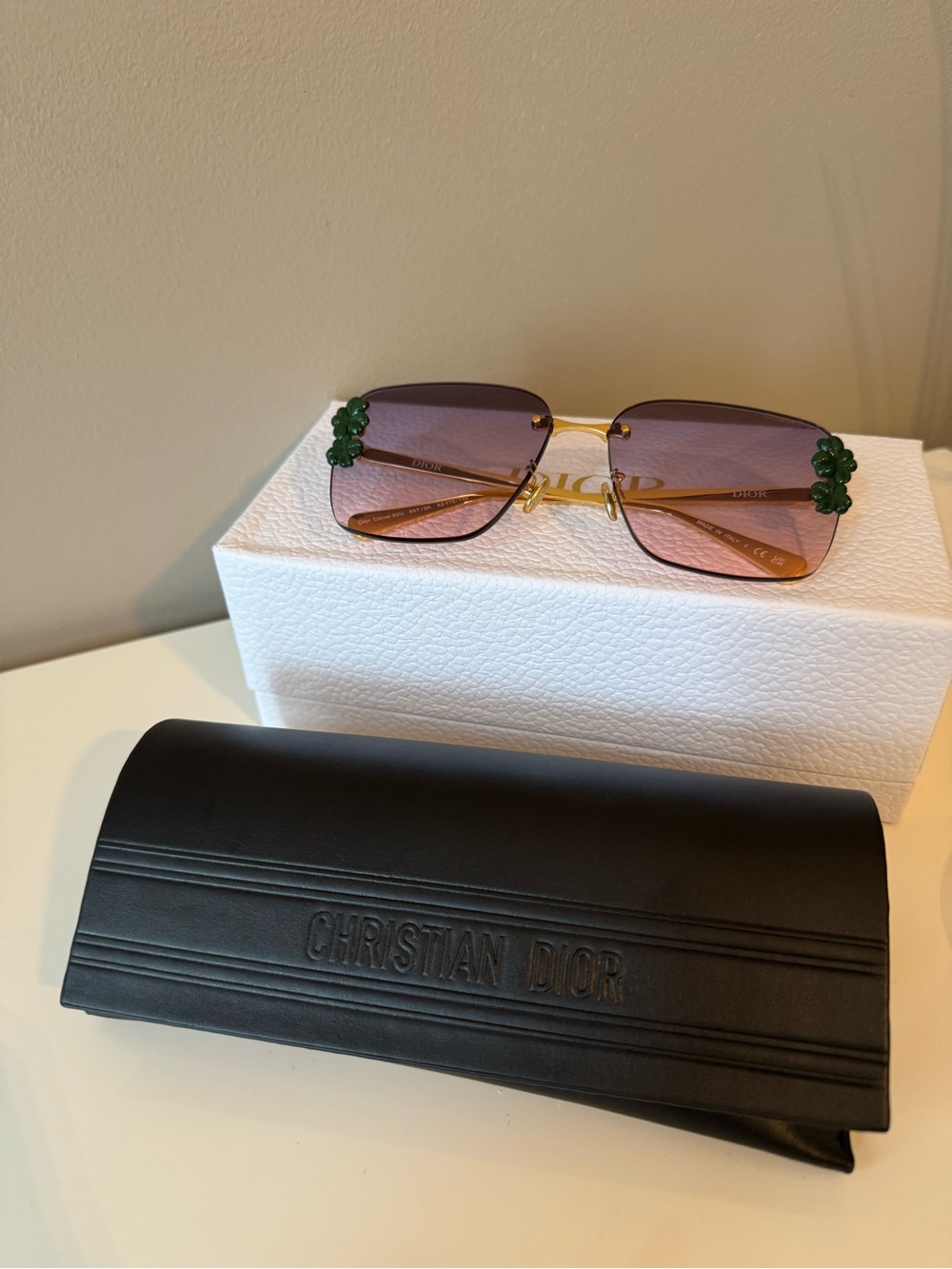 Dior Gold-Frame Sunglasses with Purple Gradient Lenses and Green Floral Accents